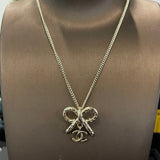 18K CC Gold Bow Tie Necklace