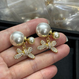 18K CD Bow Diamond Gold Earrings